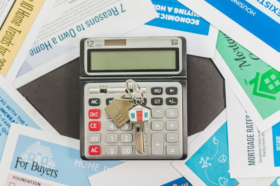A rental property and an investor's calculator
