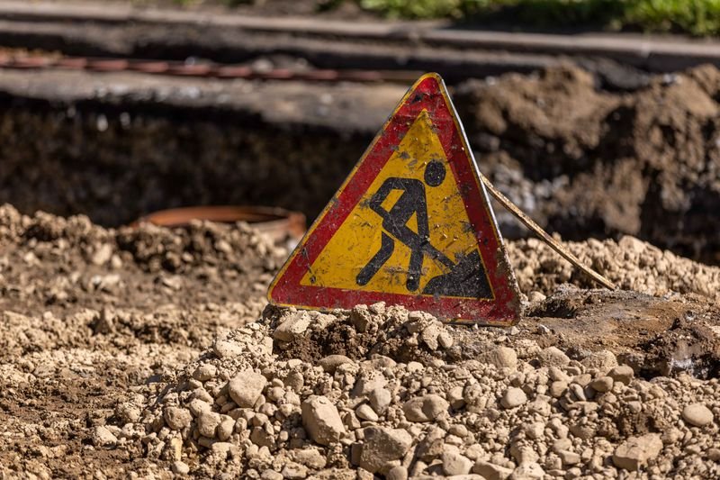 Road under active construction in a growing corridor