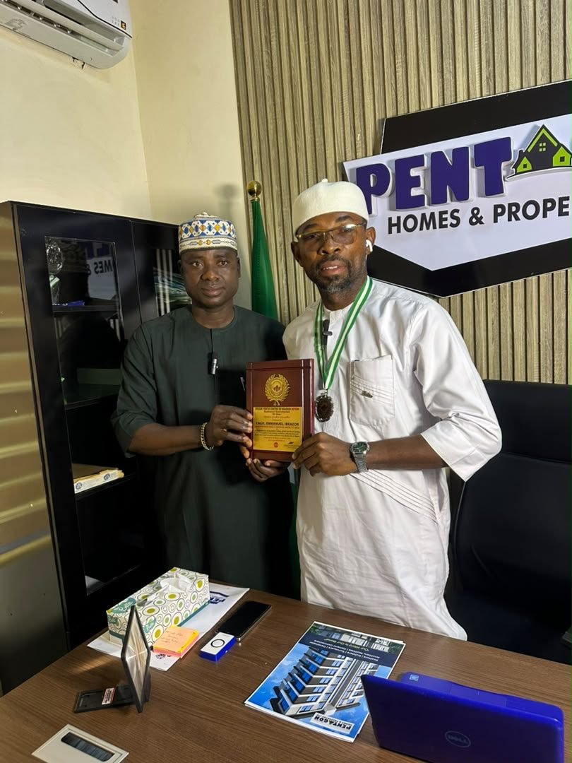 The Dream Youth Center Abuja recognition and award plaque, bearing the name of Engr. Emmanuel Ibeazor, presented in the Pentagon Homes office