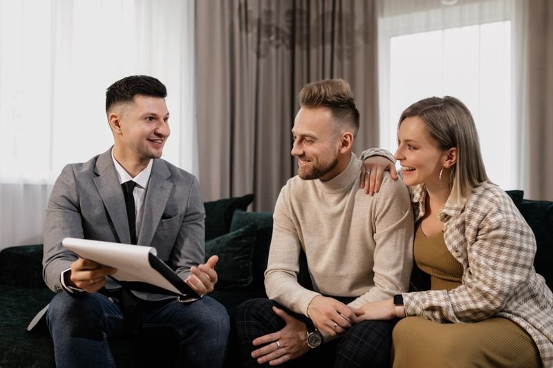 Real estate adviser explaining a payment plan to a client