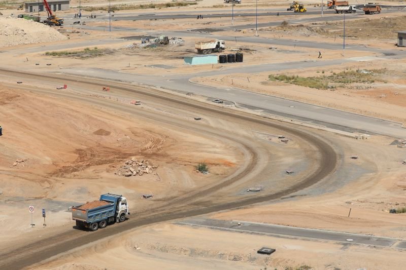 Road construction under way, the kind of funded infrastructure that lifts land value