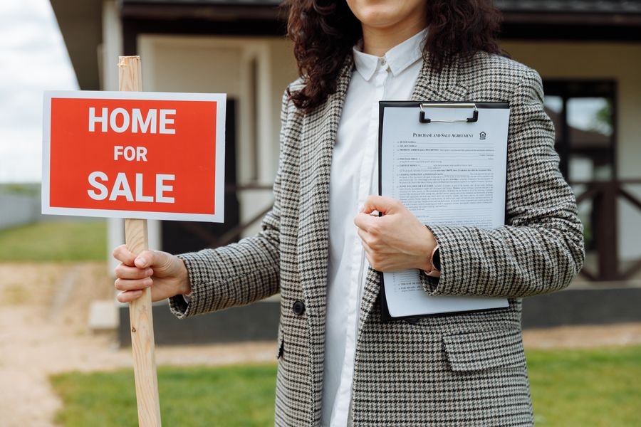 A buyer reviewing a land contract carefully