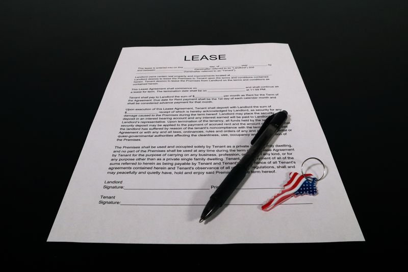 Landlord and property manager agreeing terms