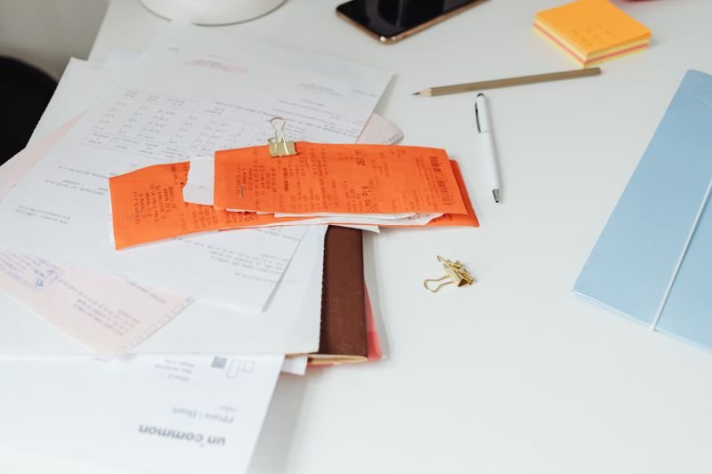 Financial regulation and fund documents on a desk
