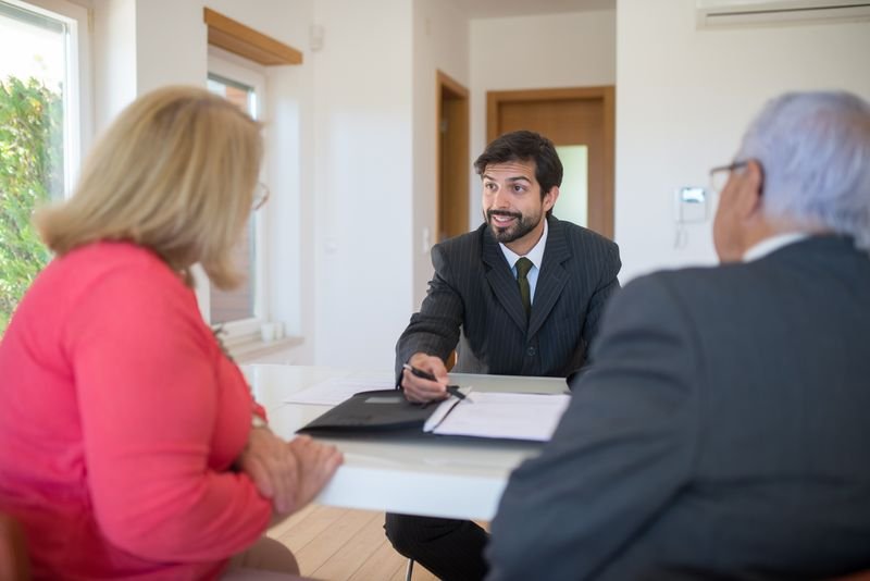 Real estate adviser reviewing options with a client