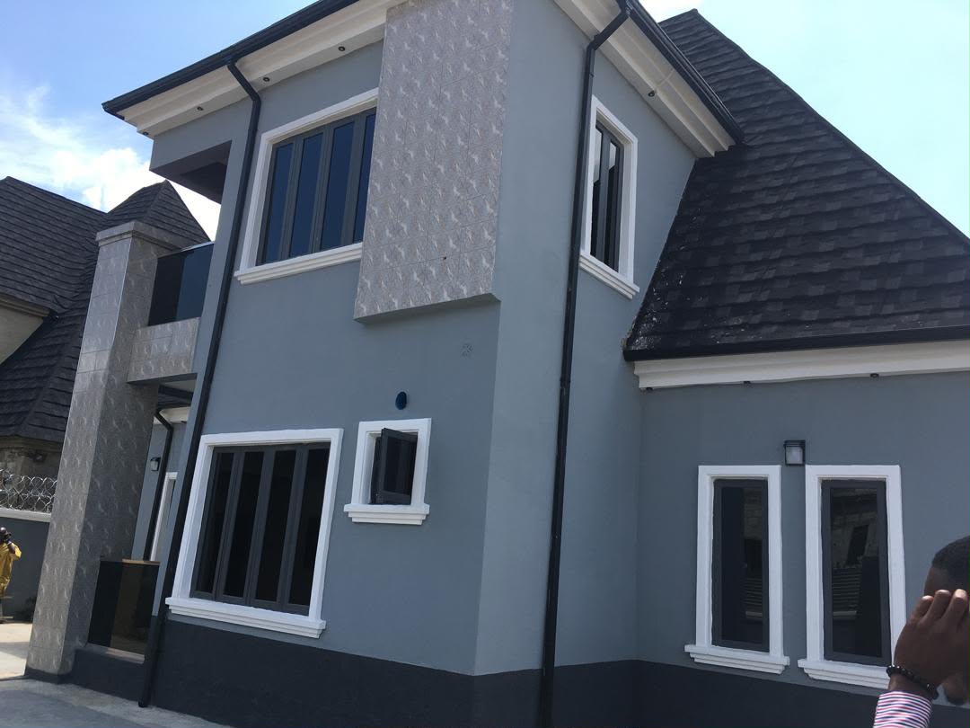 Side view of a Pentagon Homes detached duplex in Abuja